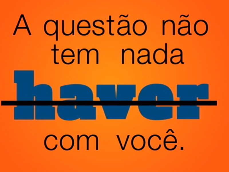 A frase "A questão não tem nada haver com você" está escrita em um fundo laranja. A palavra "haver" foi usada da forma errada propositalmente e está em letras azuis, maiores e com um risco