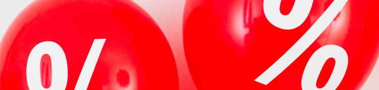 Duas bolas vermelhas com o símbolo de porcentagem