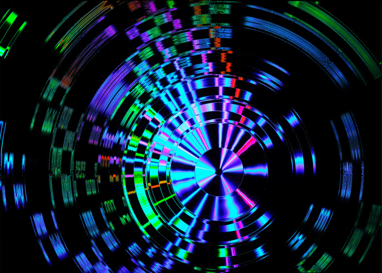 Imagem tridimensional de várias cores como o verde, roxo, azul em linhas e circulares sobre um fundo todo preto